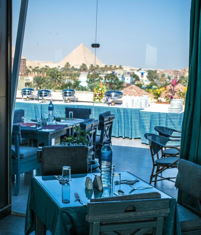 Pyramids Oasis Hotel Kafrat al Jabal Екстер'єр фото